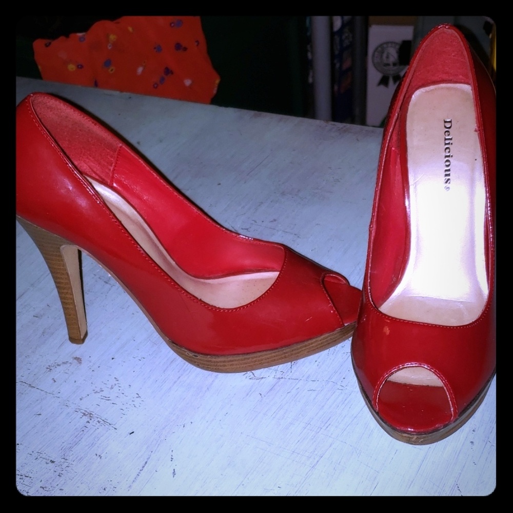 Red peeptoe spike heels